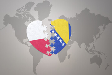 puzzle heart with the national flag of bosnia and herzegovina and poland on a world map background.Concept.
