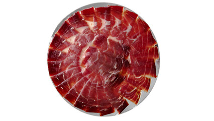 Iberico ham one hundred percent acorn-fed plated isolated on white background. Acorn-fed Iberian ham cut with a knife. Acorn-fed ham exquisite and delicious typical Spanish dish or tapa.