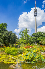Pond and flowers in front of the TV tower in Dortmund, Germany - obrazy, fototapety, plakaty
