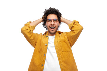 people, emotion and expression concept - happy smiling man in glasses and yellow jacket holding to his head over white background - Powered by Adobe