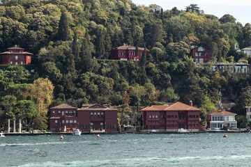View of historical, traditional mansions by Bosphorus in Kandilli area of Asian side of Istanbul. It is a sunny summer day. Beautiful travel scene.