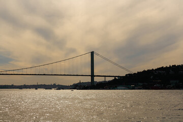 Sunset view of Bosphorus bridge in Istanbul. It is a sunny summer day. Beautiful scene.
