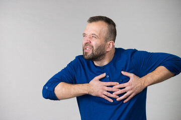 Man having heart pain attack