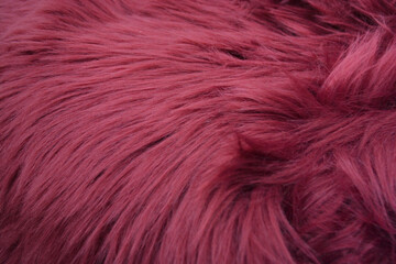 Naklejka premium Fuchsia shaggy long pile artificial fur texture