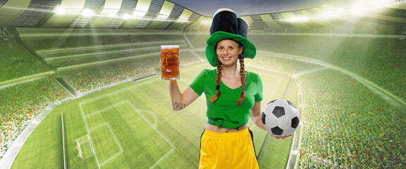 Happy excited woman in green yellow football kit holding beer mug and football ball supports favorite team. Soccer fans, competition, sport, oktoberfest concept