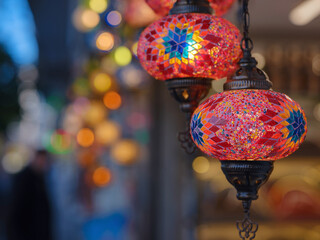 Colorful Turkish hanging lights of different colors and sizes. Turkish mosaic lambs. glass mosaic...