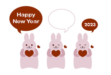 2023年卯年の年賀状イラスト: ハートを持つうさぎと吹き出し