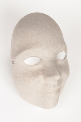 papier mache mask on white background