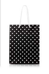 Black package for shopping or gifts with white handles and dots.