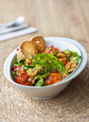 Sorrel salad with baby chard, confit cherry tomatoes, walnuts and honey mustard vinaigrette