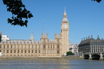 View of London, Houses of Parliament building with Big Ben. British history, Palace of Westminster, river bank.