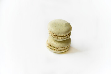 Delicious multicolored almond cookies isolated on a white background. Sweet multicolored macaroons.