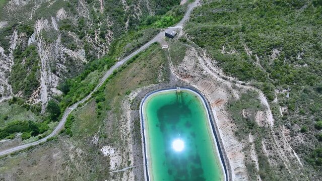 Irrigation pond in the town of Bailo seen from a drone. The Jacetania. Huesca, Aragon, Spain, Europe