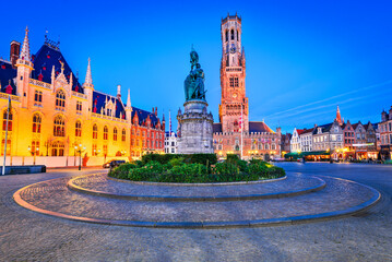 Bruges, Belgium. Blue hour in Grote Markt with Belfry, famous city of Flanders.