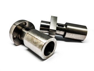 cylindrical cylinder with holes for screwing in steel, stainless steel, aluminum with a reflective silver coating 2 pieces placed side by side on a white background