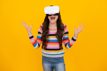 Amazed teenager using VR headset. Kid play vr video game. Digital future and innovation. Child in virtual goggles. Excited teen girl with virtual reality goggles headset isolated on yellow.