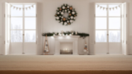 Fototapeta na wymiar Empty wooden table, desk or shelf with blurred view of Christmas living room with tree and fireplace, panoramic windows on winter landscape, modern interior design concept