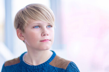 Portrait of  attractive blond teen boy 12-14 year old © R