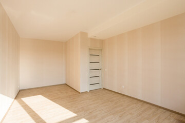 An empty bedroom with a budget clean renovation in a new apartment