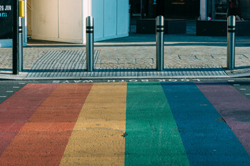 Obraz premium Colourful bricks footpath, Multicolor painted on outdoor path, Rainbow coloured on street, Symbol of gay, Lesbian, Bisexual and transgender, LGBT social movements