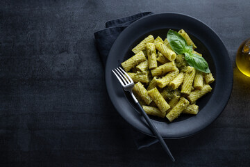 Pasta pesto and pea sauce served in bowl