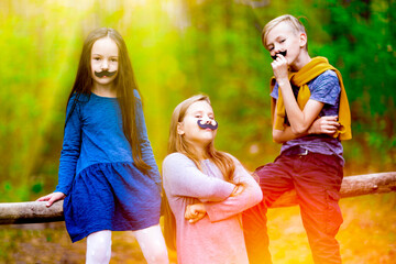 Children pose as adults with fake mustaches.