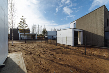 construction of new roads in a private cottage village in the Scandinavian style