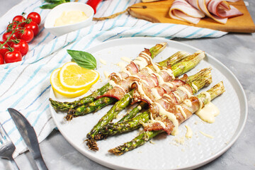Grilled green asparagus wrapped with bacon. Ketogenic diet. Healthy food
