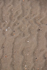 wind blown sand waves on beach