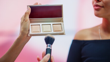 Professional Beauty Expert uses Blush Contour Palette on a Portrait of Beautiful Black Model,...