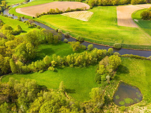 Aerial view of river Ems and pond in nature area Emsaue, Emsdetten, Muensterland, Nordrhein-Westfalen, Germany.