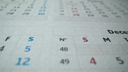 Calendar 2022. November in macro. Close-up of a beautiful autumn page of the calendar 2022 and the camera moves to halloween holiday