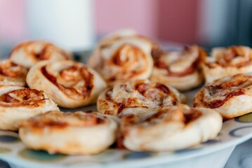 Closeup shot of mini pizza bagels on a plate