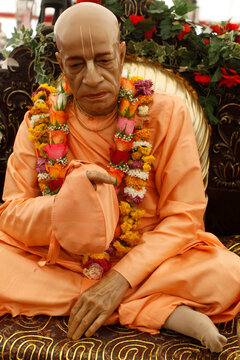 Garlanded statue of Srila Prabhupada at Janmashtami festival at Bhaktivedanta Manor ISKCON (Hare Krishna) temple