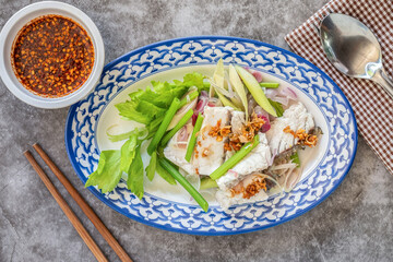Boiled Fish Dip with Hot with Jaew sauce Thai Food. From Top Angle View.