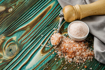 pink Himalayan salt on a wooden rustic background