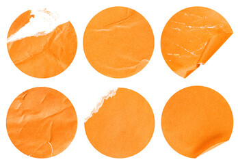 collection of six round orange stickers on a white isolated background