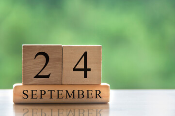 September 24 calendar date text on wooden blocks with copy space for ideas. Copy space and calendar concept