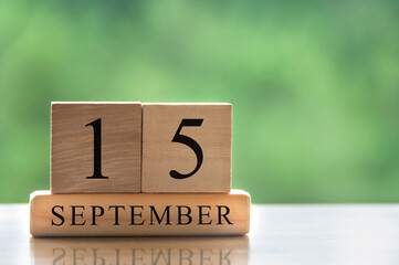 September 15 calendar date text on wooden blocks with copy space for ideas. Copy space and calendar concept