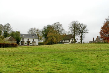 Fototapeta premium Buildings around the village green in Avebury, England