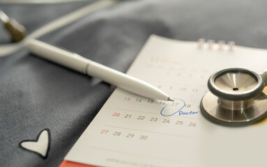 stethoscope on the calendar. Doctor Appointment.  