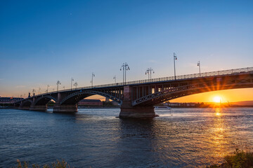Fototapeta na wymiar View of the Theodor-Heuss Bridge over the Rhine near Wiesbaden/Germany at sunset