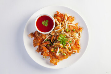 Crispy fried mussels omelette served with bean sprout and spicy sauce.