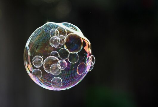 Selective Focus Of A Giant Bubble With Bubbles Inside Floating In The Air