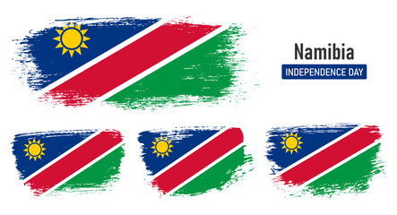 Textured collection national flag of Namibia on painted brush stroke effect with white background
