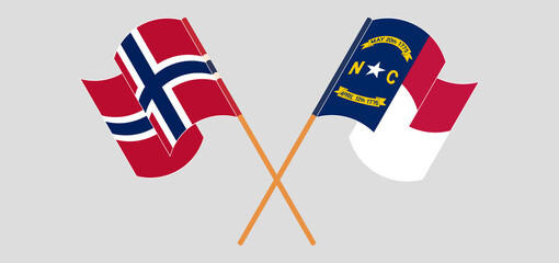 Crossed and waving flags of Norway and The State of North Carolina