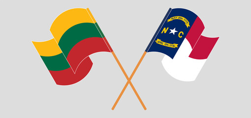 Crossed and waving flags of Lithuania and The State of North Carolina