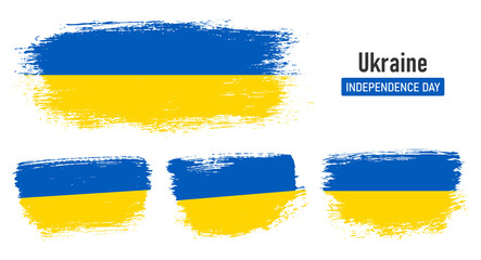 Textured collection national flag of Ukraine on painted brush stroke effect with white background