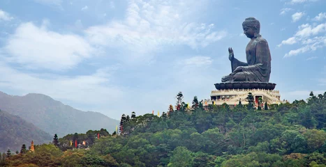 Foto op Plexiglas The Tian Tan Buddha statue is the large bronze Buddha statue. This also call Big Buddha located at Ngong Ping, Lantau Island, in Hong Kong. © KAL'VAN