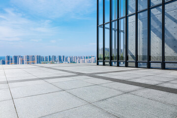 Empty square floor and city skyline with building scenery. high angle view.